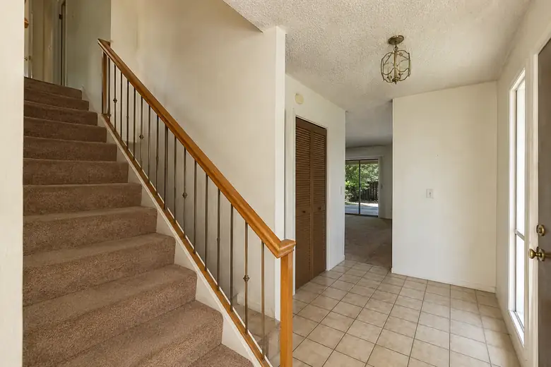 Foyer & staircase remodel — before